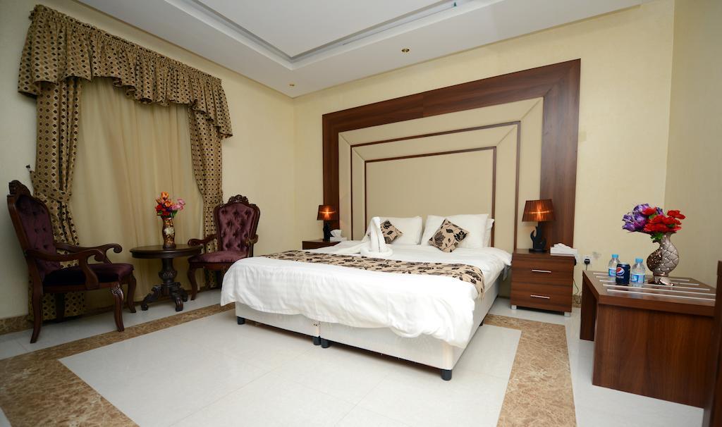 Hotelier Suites Riade Quarto foto